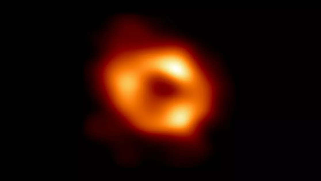 The first image, released in May, of Sagittarius A* (Sgr A* for short), the supermassive black hole at the center of the Milky Way. Image: Event Horizon Telescope Collaboration via Reuters